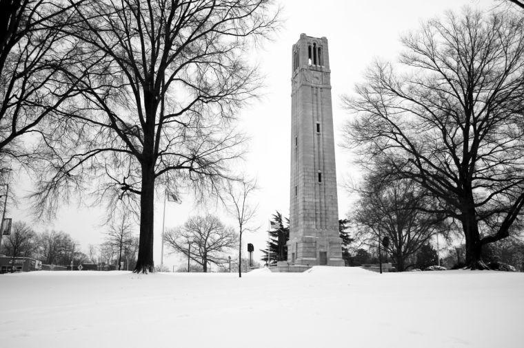 The Bell Tower stands in the snow Feb. 12, 2014 during a day off due to snow. The weather in North Carolina has changed frequently during the past few weeks. N.C. State has seen many delays due to snow and ice as well as a few spring days.