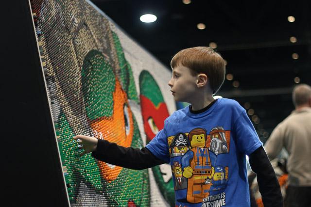 Families and children assembled Saturday at the Raleigh Convention Center at the LEGO KidsFest. The LEGO Fest featured a LEGO Model Museum of characters from fiction. Also featured was a brick pile for children to dive in and put bricks together. Two LEGO Master Builders, Steve Gerling and Chris Steininger, were present to teach tools of the trade that they have learned through their years of building with LEGOs. Gerling and Steininger built most of the models displayed in the Model Museum. As visitors exited the LEGO Fest, they had the opportunity to build a section of the United States and have it placed on a 65 feet long by 45 feet wide. Visitors could view this visitor-made model from a balcony.