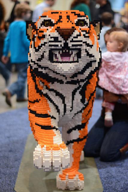 Families and children assembled Saturday at the Raleigh Convention Center at the LEGO KidsFest. The LEGO Fest featured a LEGO Model Museum of characters from fiction. Also featured was a brick pile for children to dive in and put bricks together. Two LEGO Master Builders, Steve Gerling and Chris Steininger, were present to teach tools of the trade that they have learned through their years of building with LEGOs. Gerling and Steininger built most of the models displayed in the Model Museum. As visitors exited the LEGO Fest, they had the opportunity to build a section of the United States and have it placed on a 65 feet long by 45 feet wide. Visitors could view this visitor-made model from a balcony.
