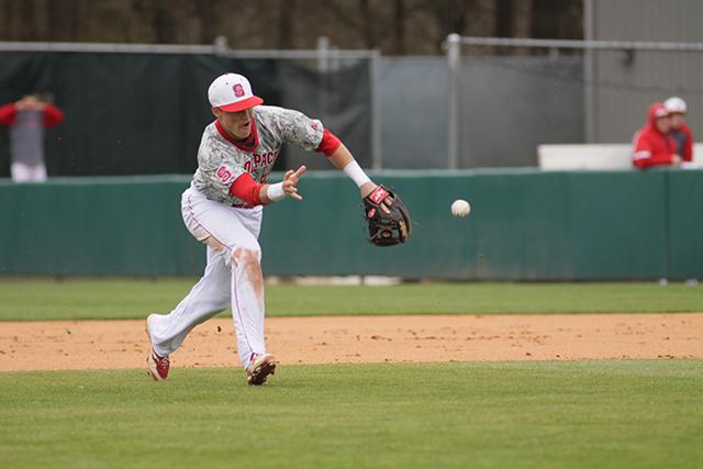 Junior second baseman Logan Ratledge tries to barehand the ball during the N.C. State loss to Miami on Sunday. The 12-5 loss dropped the Wolfpack's record to 15-11 overall and 3-9 in the ACC. The team's next home appearance will be on April 18 against Boston College at 6:30 p.m.