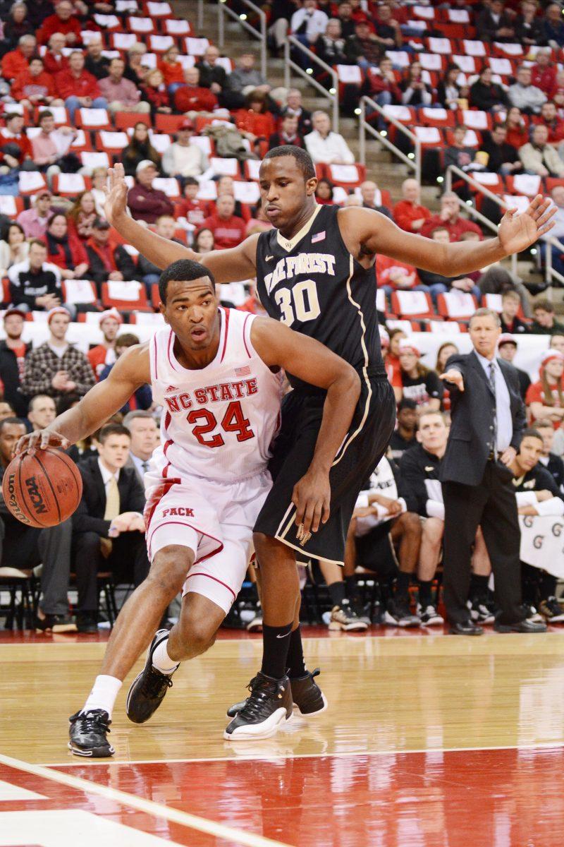 Sophomore forward T.J. Warren drives along the baseline during N.C. State&#8217;s game against Wake Forest Feb. 11 at the PNC Arena. Warren led the Wolfpack with 34 points and 10 rebounds, helping State secure a 82-67 victory over the Demon Deacons.