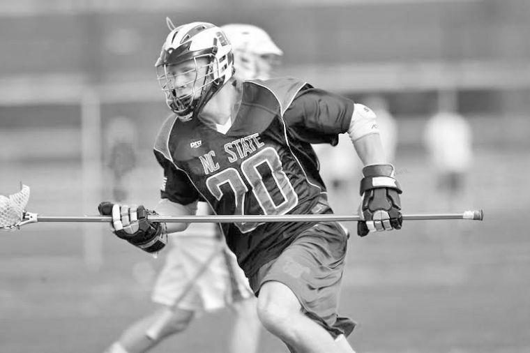 Senior defenseman Josh Blackley carries the ball during N.C. State's game against Alabama Feb. 8 in Atlanta, Ga. The Wolfpack defeated the Crimson Tide by a score of 8-7