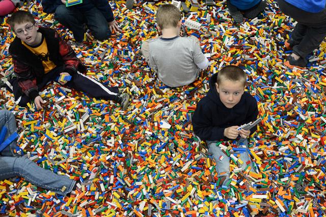 Families and children assembled Saturday at the Raleigh Convention Center at the LEGO KidsFest. The LEGO Fest featured a LEGO Model Museum of characters from fiction. Also featured was a brick pile for children to dive in and put bricks together. Two LEGO Master Builders, Steve Gerling and Chris Steininger, were present to teach tools of the trade that they have learned through their years of building with LEGOs. Gerling and Steininger built most of the models displayed in the Model Museum. As visitors exited the LEGO Fest, they had the opportunity to build a section of the United States and have it placed on a 65 feet long by 45 feet wide. Visitors could view this visitor-made model from a balcony.