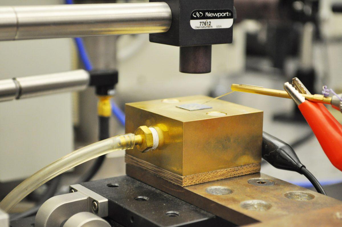 N.C. State assistant professor, Linyou Cao, researches new methods of reducing the costs of manufacturing new solar cell models.