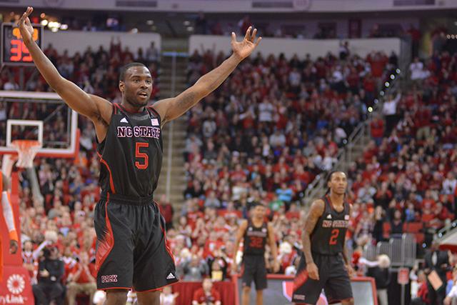 Junior guard Desmond Lee pumps up the PNC Arena crowd after sinking a 3-pointer during the Wolfpack&#8217;s game against Miami March 1. Lee scored 10 points, but State lost to the Hurricanes, 85-70.