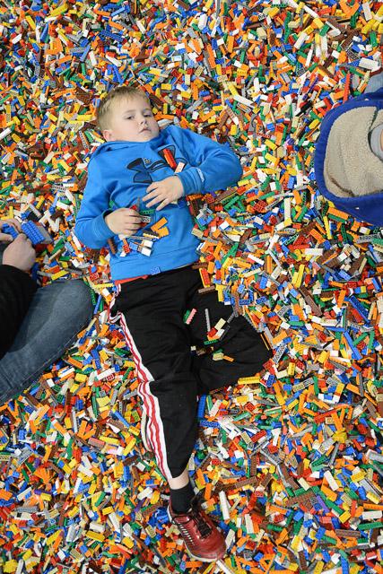 Families and children assembled Saturday at the Raleigh Convention Center at the LEGO KidsFest. The LEGO Fest featured a LEGO Model Museum of characters from fiction. Also featured was a brick pile for children to dive in and put bricks together. Two LEGO Master Builders, Steve Gerling and Chris Steininger, were present to teach tools of the trade that they have learned through their years of building with LEGOs. Gerling and Steininger built most of the models displayed in the Model Museum. As visitors exited the LEGO Fest, they had the opportunity to build a section of the United States and have it placed on a 65 feet long by 45 feet wide. Visitors could view this visitor-made model from a balcony.