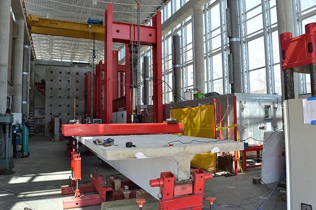 The inside of the Constructed Facilities Laboratory is used to test large to full-scale structural systems under a wide variety of environmental conditions on Centennial Campus. Photographed by Victoria Crocker.
