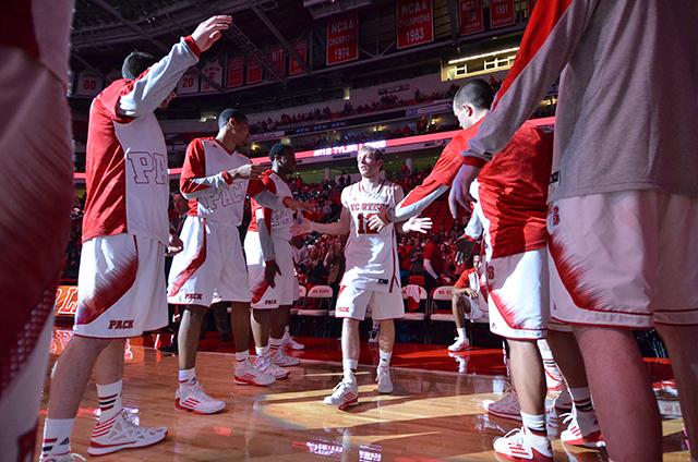 Sophomore guard Tyler Lewis takes the court before State&#8217;s game against N.C. Central at PNC Arena Nov. 20, 2013.