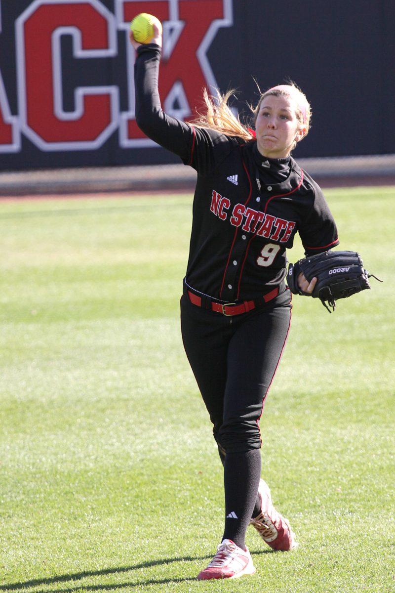 Freshman left-fielder Hannah Yeager throws the ball during warm ups at the N. C. State win over Elon University March 26. The 13-5 win improved the Wolfpack&#8217;s record to 20-10. The team&#8217;s next home appearance will occur April 9 against East Carolina.