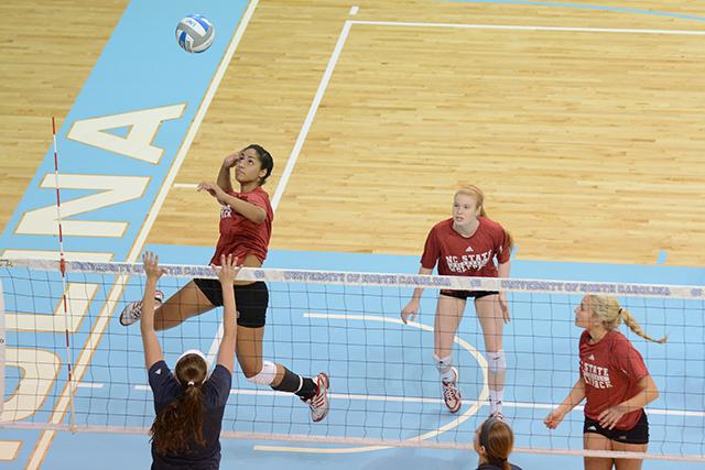 Junior middle blocker Alesha Wilson spikes the ball during the UNC-Chapel Hill Spring Volleyball Tournament Saturday.