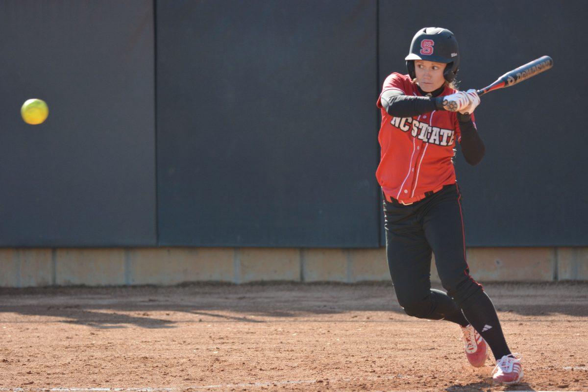 &#160;Sophomore third baseman Lana Van Dyken prepares to make a running hit during NCSU&#8217;s first game of a double-header against UNC-Wilmington Wednesday at Dail Softball Stadium.