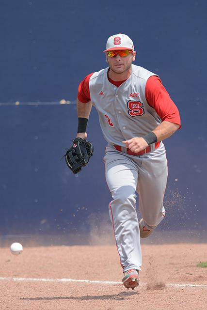 Junior outfielder Bubba Riley chases the ball during N.C. State&#8217;s game against Duke in Durham Sunday at the Durham Bulls Athletic Park.