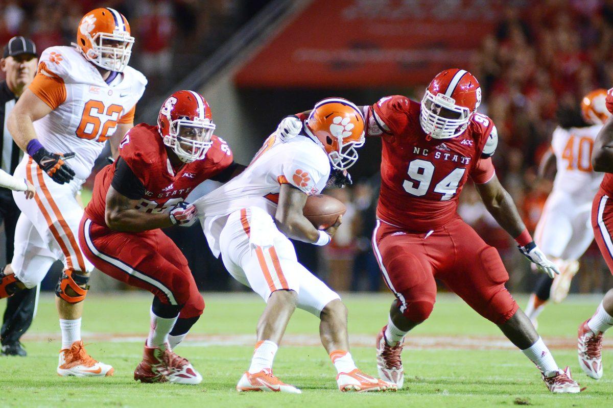 Redshirt junior defensive end Mike Rose and sophomore defensive tackle Monty Nelson combine to sack former Clemson quarterback Tajh Boyd Sept. 19, 2013.