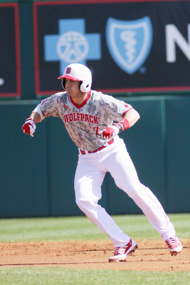 Junior right fielder Brett Austin tries to steal third base during N.C. State&#8217;s 16-1 win over Youngstown State March 3 at Doak Field in Raleigh.