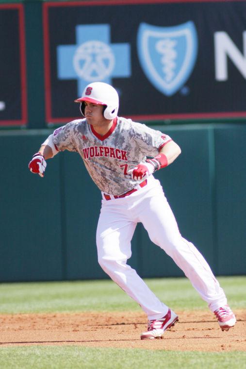 Junior right fielder Brett Austin tries to steal third base during N.C. State&#8217;s 16-1 win over Youngstown State March 3 at Doak Field in Raleigh.