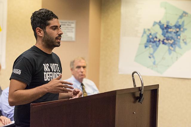 Bryan Perlmutter, Program Coordinator of IgniteNC and 2013 graduate of N.C. State, advocates for the addition of N.C. State as an early voting station for the fall election at the Wake County Board of Elections meeting Tuesday afternoon in downtown Raleigh.