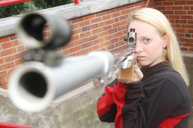 Redshirt junior Dani Foster poses with her rifle at a photo shoot. Foster returns to competition for the NC State rifle team after missing her sophomore season due to a leg injury.