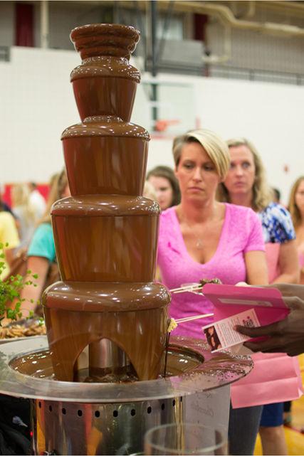 The smell of freshly prepared chocolate confections wafted through the halls of Carmichael Gym Friday, Sept. 19, as students and visitors took part in the NC State Women's Center's Chocolate Festival. The annual event is hosted to raise funds for breast cancer research.
