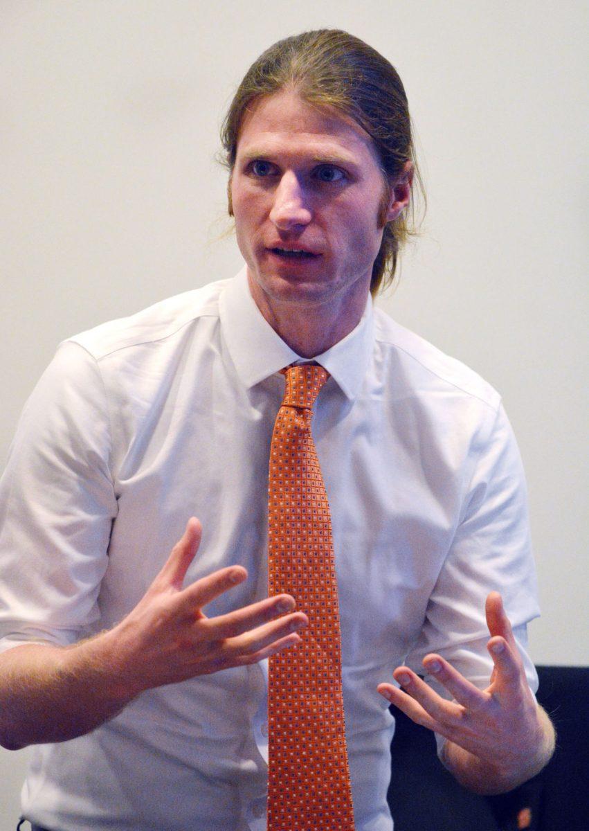 David Fiala, president of the University Graduate Student Association, helped lead the town hall meeting to discuss student fee increases on Wednesday.