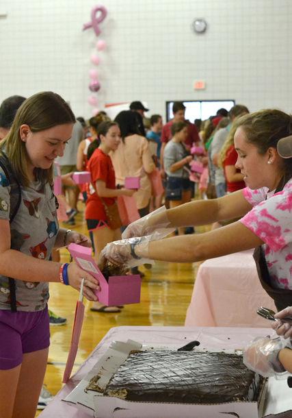 The smell of freshly prepared chocolate confections wafted through the halls of Carmichael Gym Friday, Sept. 19, as students and visitors took part in the NC State Women's Center's Chocolate Festival. The annual event is hosted to raise funds for breast cancer research.
