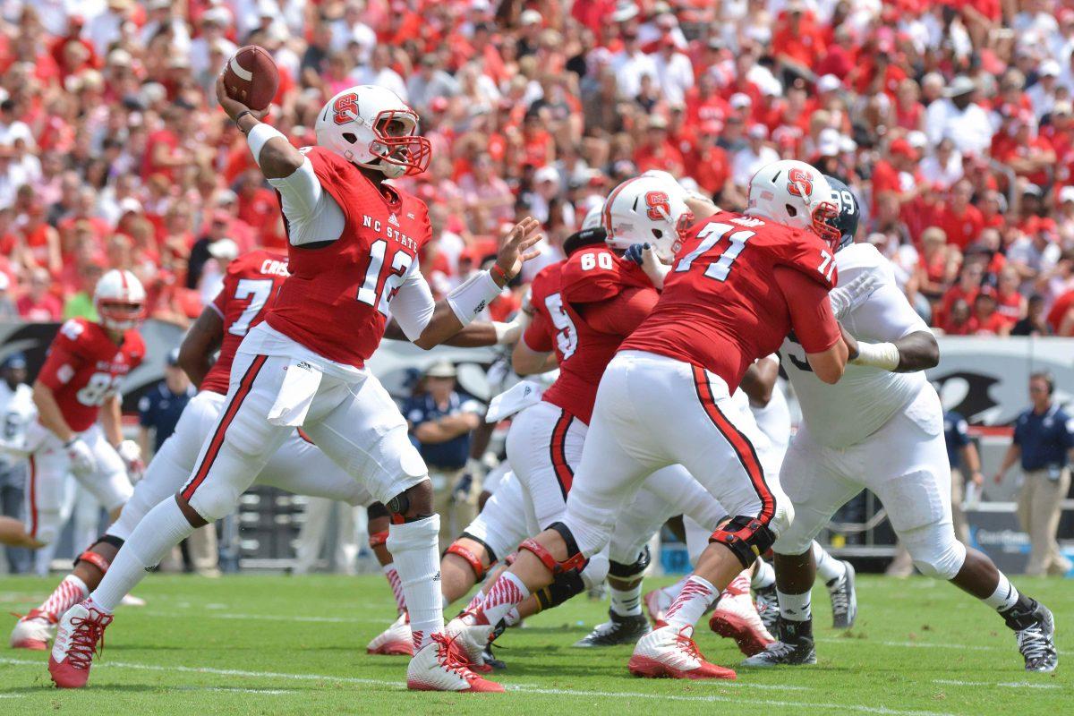 Redshirt junior quarterback Jacoby Brissett throws a pass during the game against Georgia Southern in Carter-Finley Stadium Saturday, Aug. 30, 2014. The Wolfpack defeated the Eagles, 24-23.