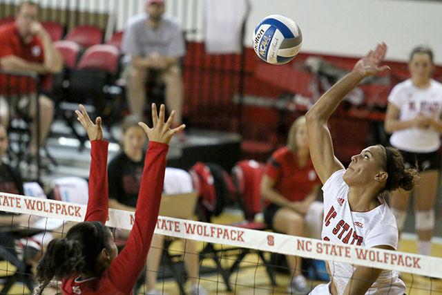 Freshman middle blocker Erica Narel prepares to hit the ball during the Red vs. White volleyball scrimmage on Aug. 22 in Reynolds Coliseum.