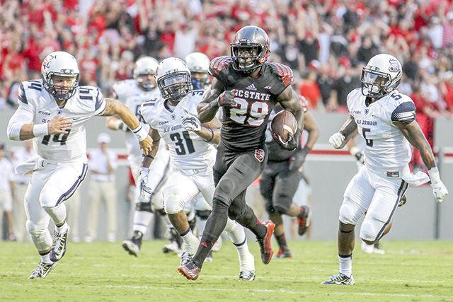 Sophomore corner back Jack Tocho returns a fumble for a touchdown that would eventually be called back vs. Old Dominion on Sept. 6. The Wolfpack won the contest 46-34, and after a win over South Florida by a score of 49-17, are undefeated and ranked fifth in the Technician&#8217;s ACC - Atlantic power rankings.