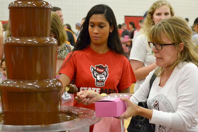 The smell of freshly prepared chocolate confections wafted through the halls of Carmichael Gym Friday, Sept. 19, as students and visitors took part in the NC State Women's Center's Chocolate Festival. The annual event is hosted to raise funds for breast cancer research.