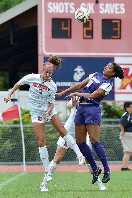 Junion defender Dayna Tomayko jumps for a header against Portland Sunday, August 28, 2014. The Wolfpack fell to the No. 11 Pilots 2-1 at Dail Soccer Field.