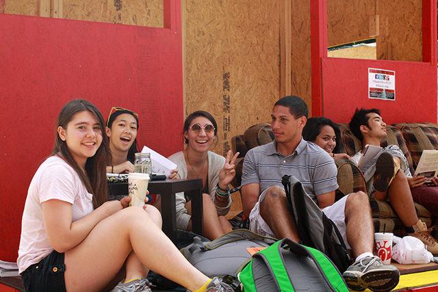 Students Susan Mykalcio, Stephen Lai, Emerald Muniz, Rebecca Eskalis, Luis Molina and Angel Xavier Negron sit and socialize outside of the Multicultural Shack on Monday.