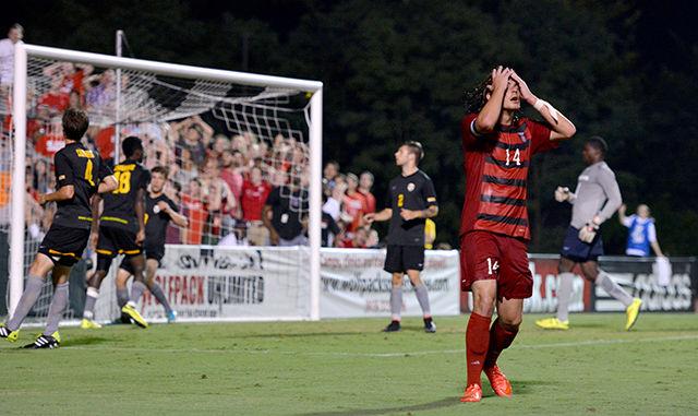 Junior left back Reed Norton reacts to a failed attack against Valparaiso on Friday. The Wolfpack drew 0-0 after double overtime.