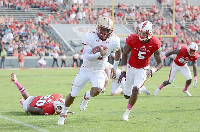 Redshirt junior safety Hakim Jones and senior linebacker Rodman Noel trail graduated Boston College quarterback Tyler Murphy early in the first quarter Saturday, Oct. 11 at Carter-Finley Stadium.&#160; Jones and Noel totaled 13 tackles and assists during the game. The Eagles defeated the Wolfpack 30-14, dropping State to fifth place in the ACC&#8217;s Atlantic division in the Technician&#8217;s power rankings.