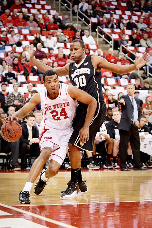 Sophomore forward T.J. Warren drives down the baseline during the game against Wake Forest in the PNC Arena Tuesday, Feb. 11, 2014. Warren led the team with a career high 34 points and ten rebounds in the Wolfpack&#8217;s 82-67 victory over the rival Demon Deacons. Technician Archive.