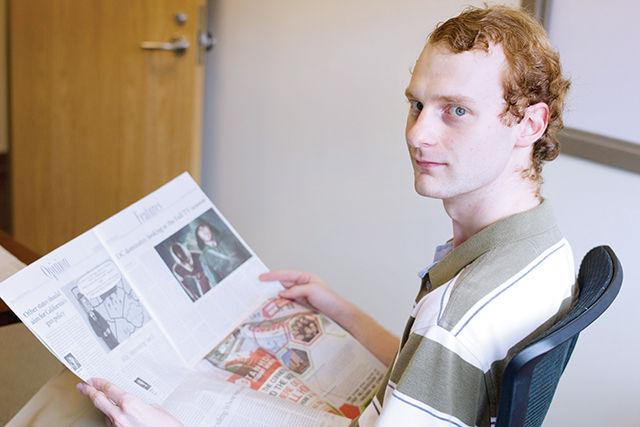 Barry Peddycord III, grad student in Computer Science, reads The Technician every morning in his office. He has collected every issue for the past six years, and still goes back and reads them Saturday, Oct. 4th, in Engineering Building III. Photo by Ben Leeds