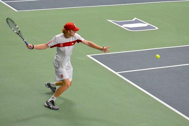 Junior Simon Norenius hits a forhand as he rallies with Duke player Chris Mengel at the Duke Fab Four Inivtational on September 13, 2014. Simon beat Chris 6-4, 6-4 to enter the semifinals and would make it to the finals in doubles.