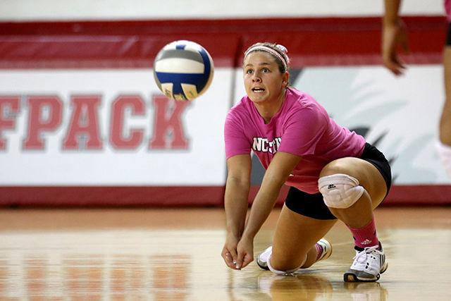 Senior libero Alston Kearns gets low to return a serve Oct. 26 during NCSU's matchup with Boston College at Reynolds Coliseum. The Wolfpack defeated the Eagles 3-1.