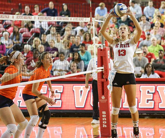 Sophomore Maggie Speaks sets the ball against Syracuse. The Wolfpack swept Syracuse 3-0 on Sept. 26.&#160;