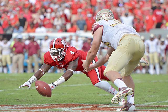 Redshirt freshmen linebacker Jerod Fernandez blocks an opposing player from receiving a pass while playing Florida State University on Sept. 28. Fernandez, along with six other players, is suspended from playing in&#160; Saturday&#8217;s game against Louisville.