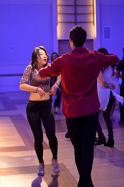 Peiwei Li, a junior in the skema business school in centennial, and Reuben Valerian, a junior in electrical engineering dance to the tunes of latin music at the event Salsabor under the stars which took place on Saturday, October 25th in the talley ballroom. The event began with an overview of Latin dances and featured a live salsa band, Orquesta Gardel.