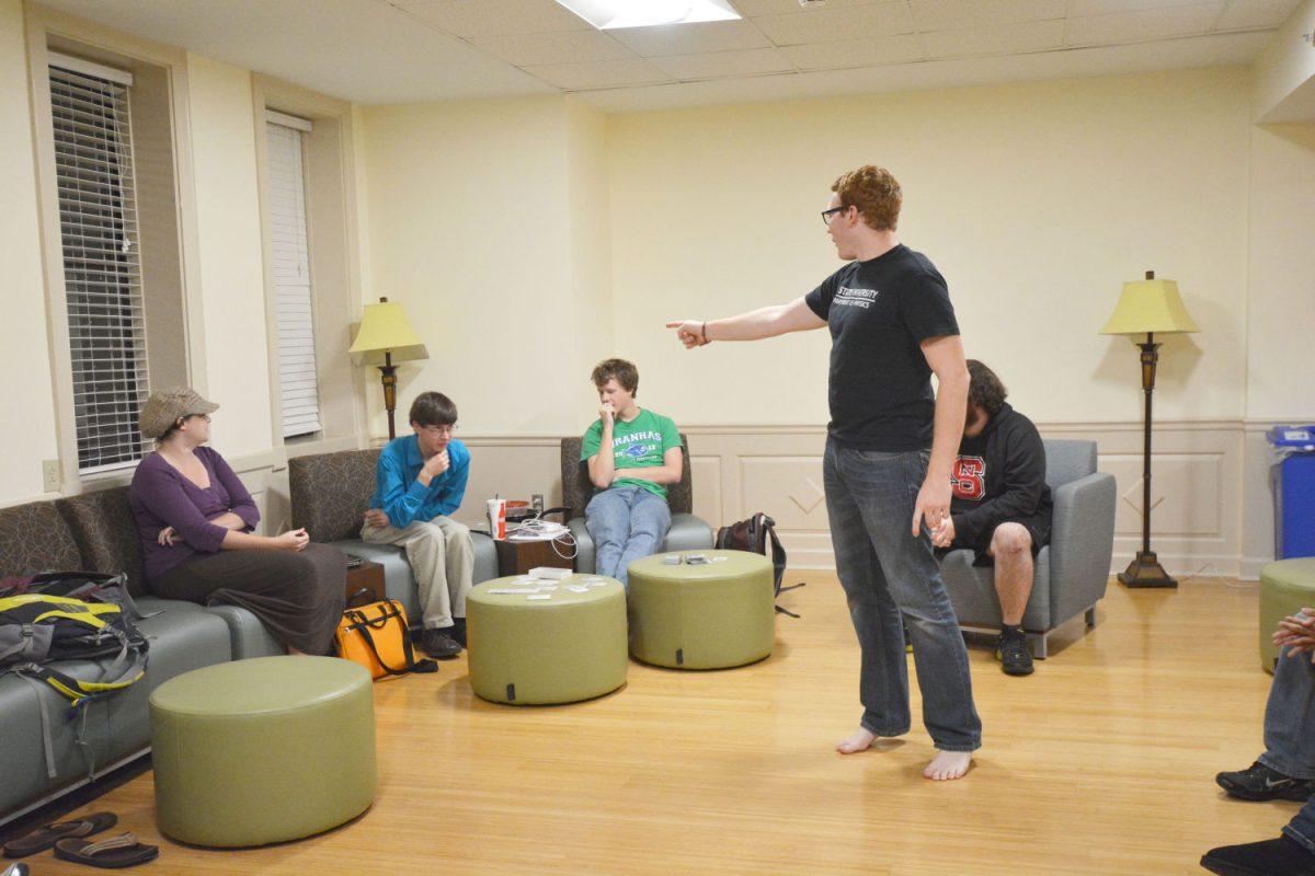 the narrator calls out player on being dead after a vote from the mafia. The game was played in berry dorm lounge on Sept. 30th. Photo by Kai McNeil