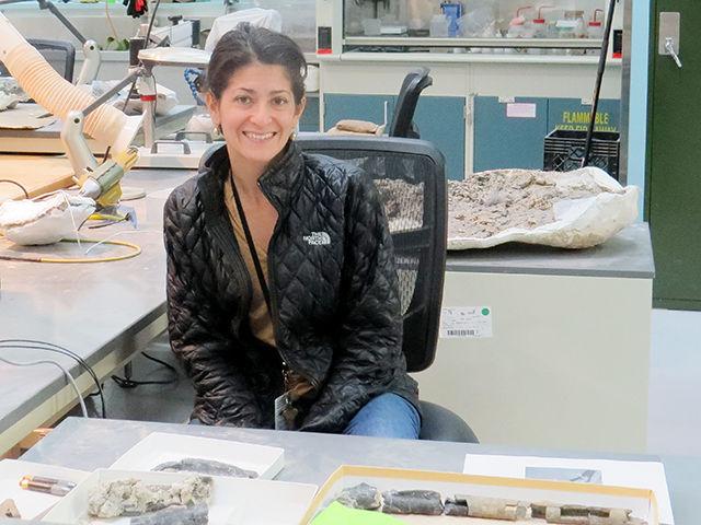 Professor Lindsay Zanno poses in her lab at the NC Museum of Natural Science. Zanno is an assistant research professor in the Department of Biology at NC State and the Director of the Paleontology and Geology Research Laboratory at the NC Museum of Natural Science.