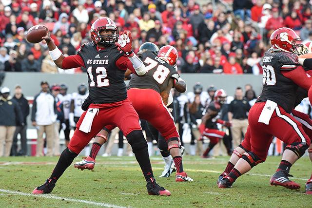 Redshirt junior quarterback Jacoby Brissett throws a pass during the final home game against Wake Forest in Carter-Finley Stadium Saturday. Brissett threw for 83 yards in the Wolfpack's 42-13 victory over the Wake Forest Demon Deacons.