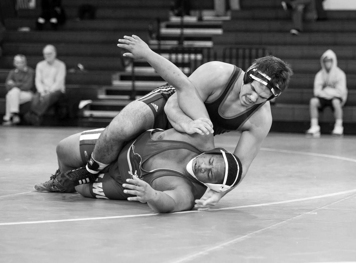 N.C. State Wrestling took on Lindsey-Wilson in wrestling on Sunday, November 24, 2013 at Cardinal Gibbons High School in Raleigh.