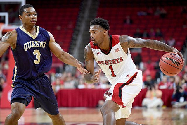 Redshirt junior Trevor Lacey looks for a way to the basket during the exhibition game against Queens University in PNC Arena Saturday. Lacey had 7 points, 4 assists and 3 steals in the Wolfpack's 78-47 victory over the Royals.