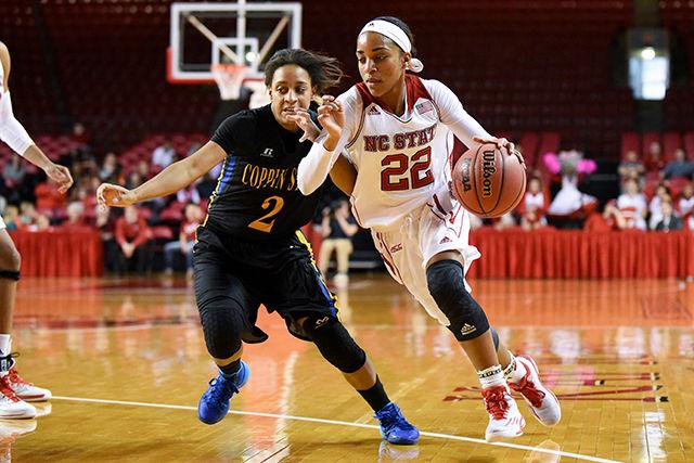 Redshirt sophomore guard Dominique Wilson drives to the basket during the women's basketball game against Coppin State in Reynolds Coliseum on Sunday. Wilson contributed 17 points to the Wolfpack's 81-61 victory over the Eagles.