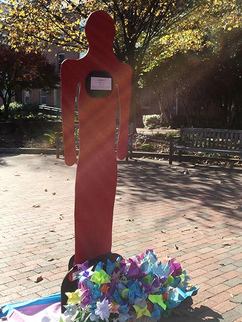 The Women&#8217;s Center and GLBT Center partnered to honor those who have fallen victim to anti-transgender violence. A Silent Witness silhouette was present in honor of Sevda Basar, a 28-year old transgender woman who was murdered by her boyfriend in February. On Thursday 10am-2pm, NCSU students, faculty, and staff could show their solidarity and place a paper flower at the feet of the silhouette and take a moment of silence for Sevda, her 200 fellow victims and the unknown number of voices pressured into silence for fear of violence. 127 members of the campus community placed flowers at the base of the Silent Witness Silhouette memorial.