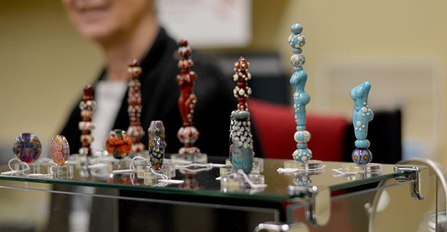 Artist Betty Fetvedt displayed her work at the 30th Annual Crafts Center Fair and Sale held in Thompson Hall on Saturday. The Fair drew a huge crowd and offered shoppers great selections for the upcoming gift-giving season.