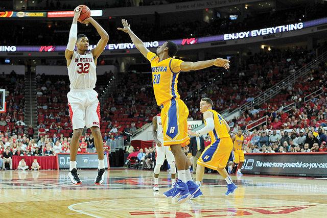Sophomore forward Kye Washington shoots a field goal against Hofstra Monday, Nov. 17, 2014. Washington had six rebounds in the Wolfpack's 76-64 win over the Pride at PNC Arena.