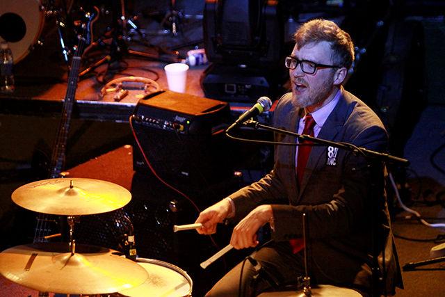 Bombadil's James Philips sings and plays the drumset during WKNC's Double Barrel Benefit Feb. 14, 2014 at Lincoln Theatre.