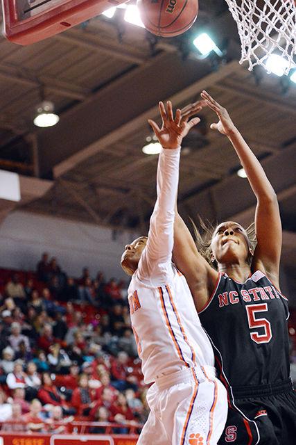 Chelsea Nelson, freshmen and forward for the wolfpack scores a goal against Clemson at the women's basketball game that took place on Saturday, Jan 10, 2015 at the Renolds Collesium. Nelson had a field goal and was in play for 9 minutes. The wolfpack won 76-50 against Clemson.